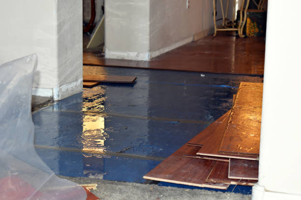 Professional Emergency Water Damage Restoration technician working in Manorville, NY